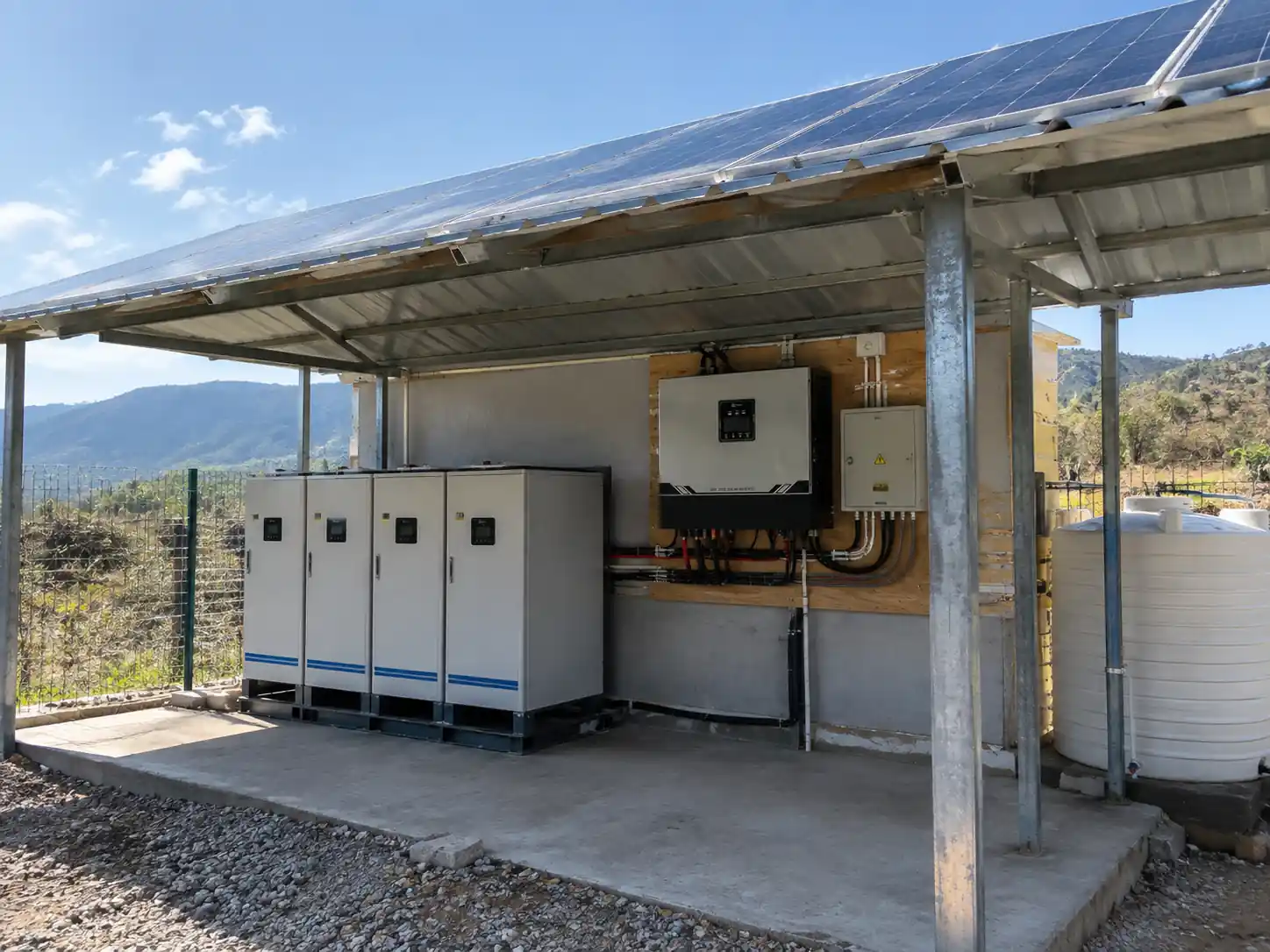 Village off-grid solar power system with battery storage